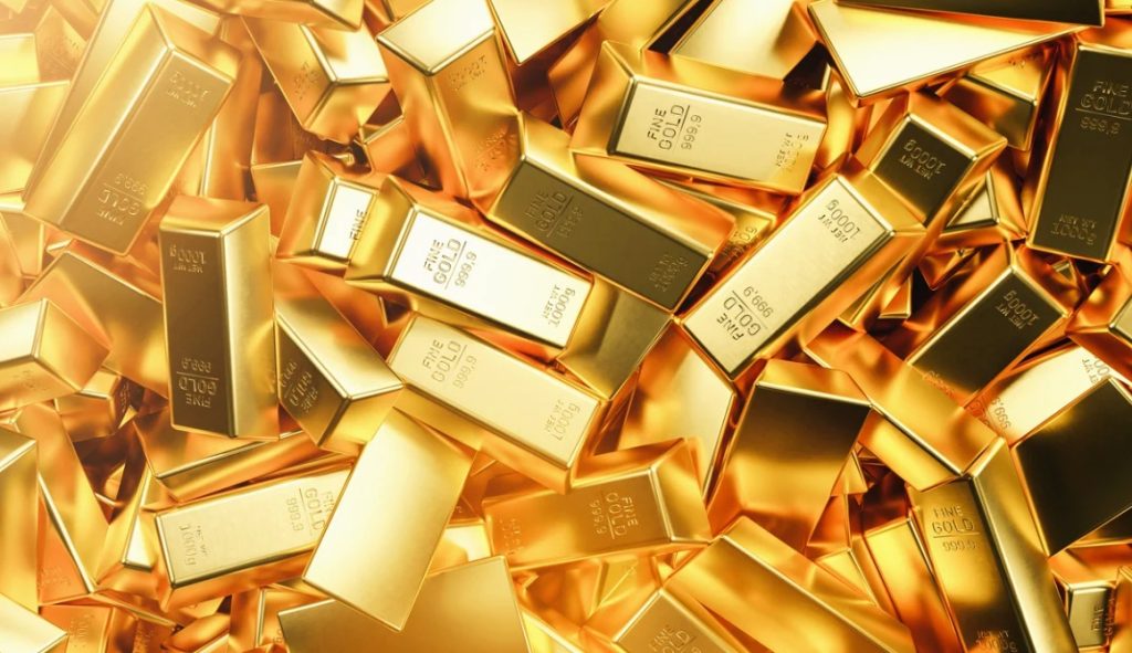 Photo of gold bars in a pile